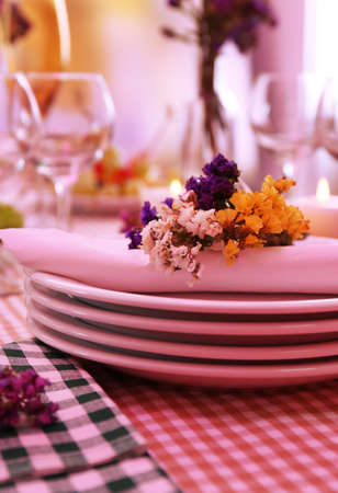 Buffet table with dishware waiting for guestsの写真素材