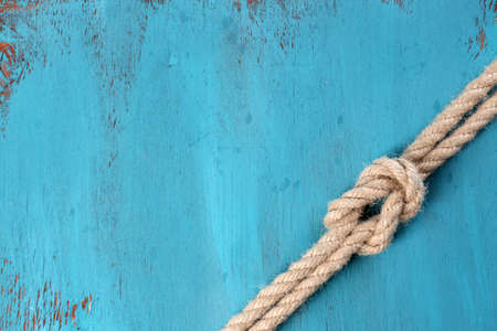 Marine knot on wooden backgroundの写真素材