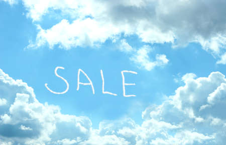Blue sky background with cloudsの写真素材