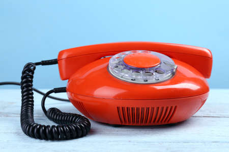 Retro red telephone on color background, close upの写真素材