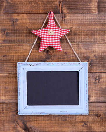 Rectangular chalkboard on wooden backgroundの写真素材