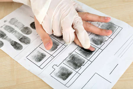 Taking fingerprintsの写真素材