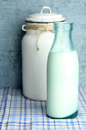 Retro still life with tasty rustic milk, on tableの写真素材