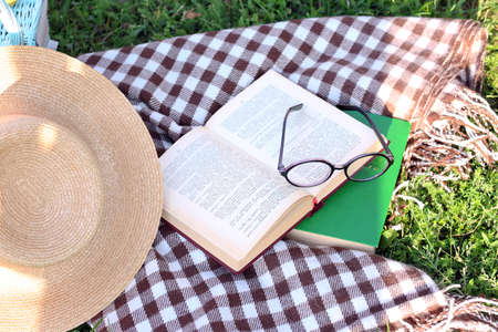Reading books, outdoorsの写真素材