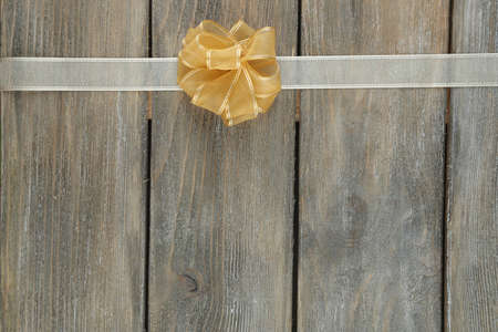 Old wooden background with beautiful bowの写真素材