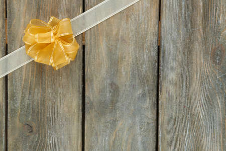 Old wooden background with beautiful bowの写真素材