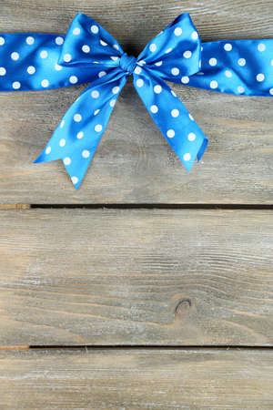 Old wooden background with beautiful bowの写真素材