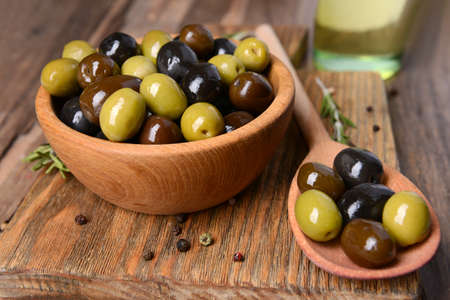 Different marinated olives on table close-upの写真素材