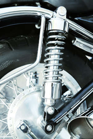 Motorcycle shock absorber, close-upの写真素材