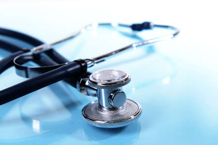 Stethoscope on light blue backgroundの写真素材