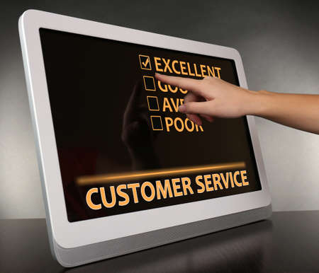 Hand touching tablet pc screen, Customer Service conceptの写真素材