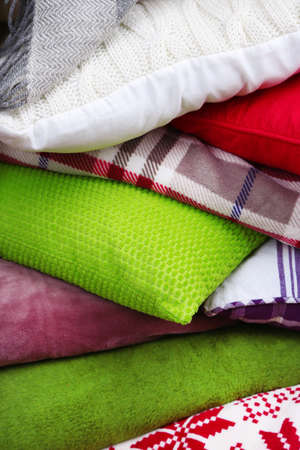 Pile of plaids and pillows, macro viewの写真素材