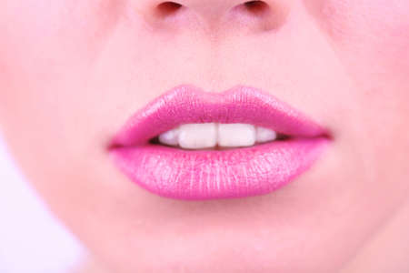 Pink lipstick on lips, macroの写真素材