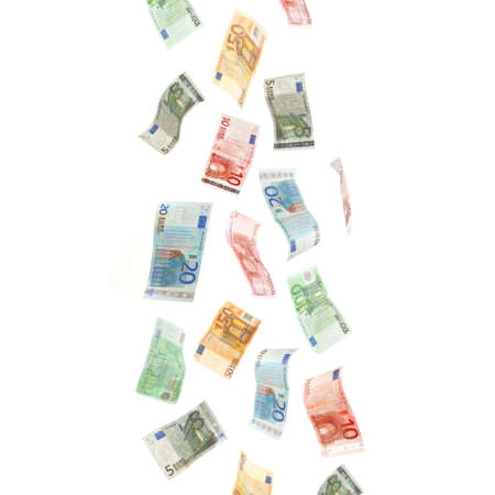 Flying Euro banknotes isolated on whiteの写真素材