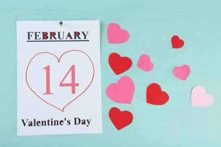 Valentines Day, February 14 on calendar on wooden backgroundの写真素材