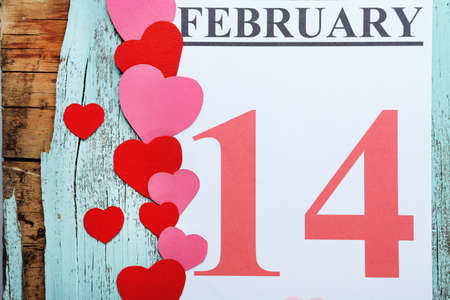 Valentines Day, February 14 on calendar on wooden backgroundの写真素材