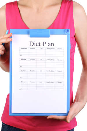 Sports trainer with diet program isolated on whiteの写真素材