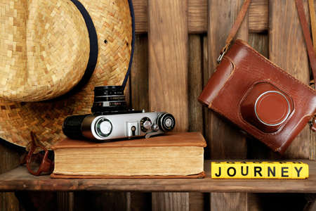 Set of tourist with word Journey on wooden planks backgroundの写真素材