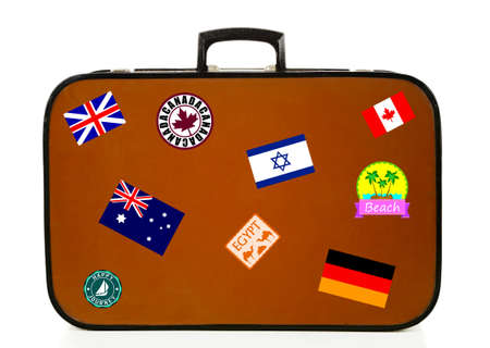 Travel suitcase isolated on whiteの写真素材