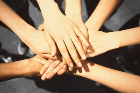United hands outdoorsの写真素材