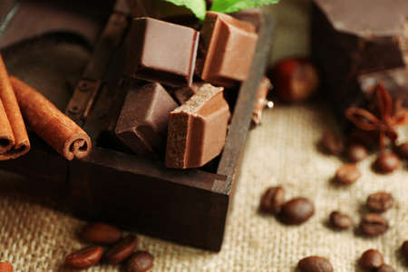 Still life with set of chocolate on burlap cloth, closeupの写真素材