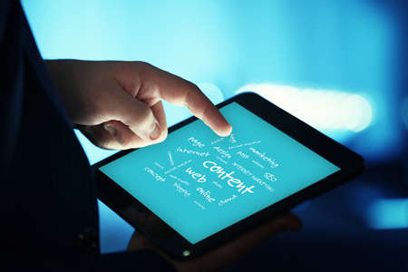 Connected words on touch-screen tablet-pcの写真素材