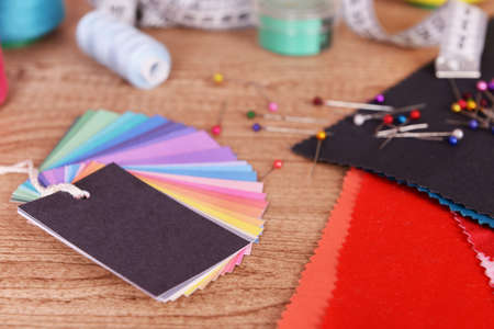 Samples of colorful fabric on wooden backgroundの写真素材