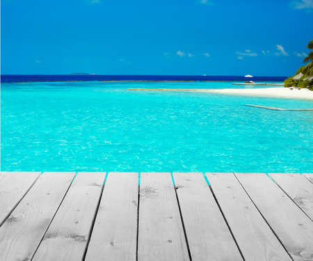 Wooden pier with beautiful sea or ocean  backgroundの写真素材