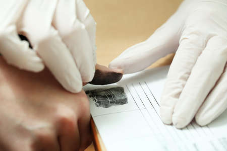 Taking fingerprintsの写真素材