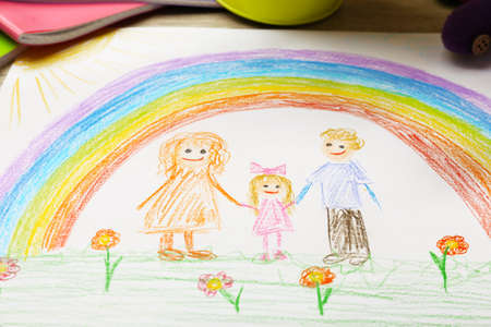 Kids drawing on white sheet of paper, closeupの写真素材