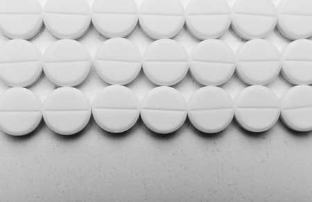 Pile of white pills, closeupの写真素材