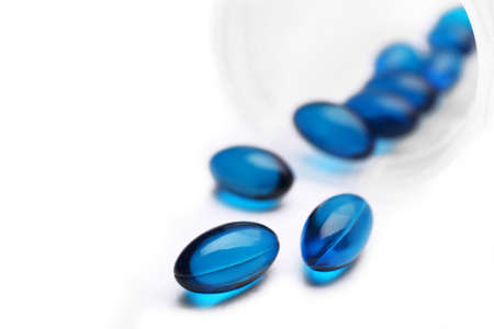 Pile of pills isolated on whiteの写真素材