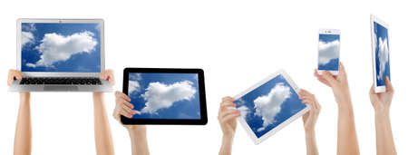Hands holding electronic gadgets with sky on screens, isolated on white. Cloud computing conceptの写真素材