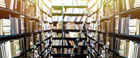 Library bookshelves backgroundの写真素材