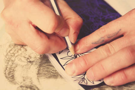 Professional tattoo artist drawing sketchの写真素材