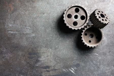 Group of rusty transmission gears on table close upの写真素材