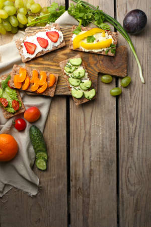 Still life with vegetarian sandwiches on wooden tableの写真素材