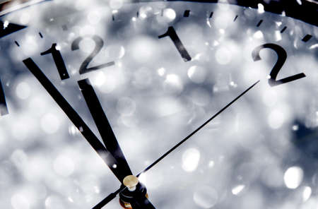 New Year's clock with shining backgroundの写真素材