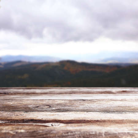 Wooden table on blurred nature backgroundの写真素材