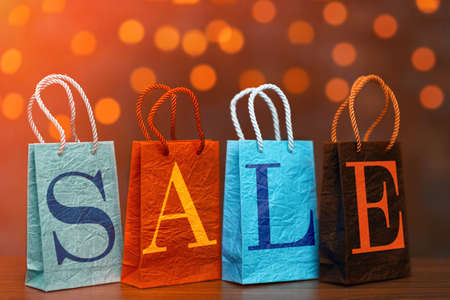 Word sale made with paper bags on abstract backgroundの写真素材
