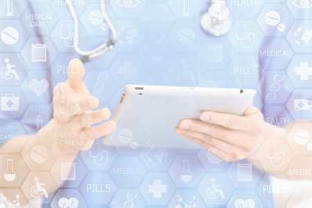 Medicine doctor working with modern digital tablet-pc. Medical network conceptの写真素材