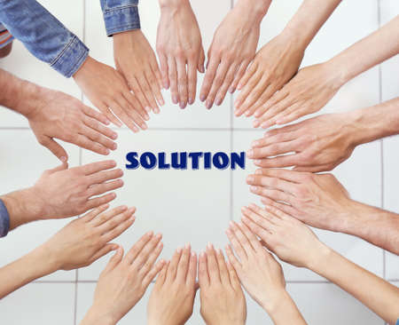 Business training concept. United hands, top viewの写真素材
