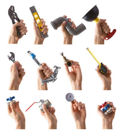 Set of male hands holding plumbing equipment on white background. Repair and maintenance concept.の写真素材