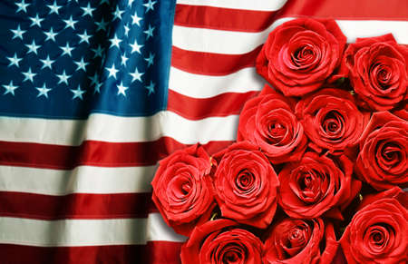 Roses on USA flag background. Symbol of Americaの写真素材
