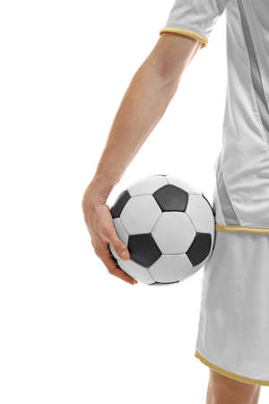 Professional football player holding ball on white background, closeupの写真素材