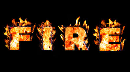 Burning word FIRE on black backgroundの写真素材