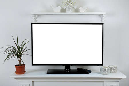 Blank TV display on stand in living roomの写真素材