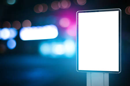 Mockup of billboard and blurred city lights on backgroundの写真素材