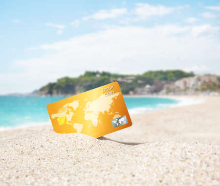 Credit card on tropical beachの写真素材