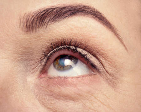 Cataract concept. Senior woman's eye, closeupの写真素材